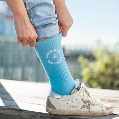 Nordic Spirit Merchandising: Hellblaue Socken mit Logo